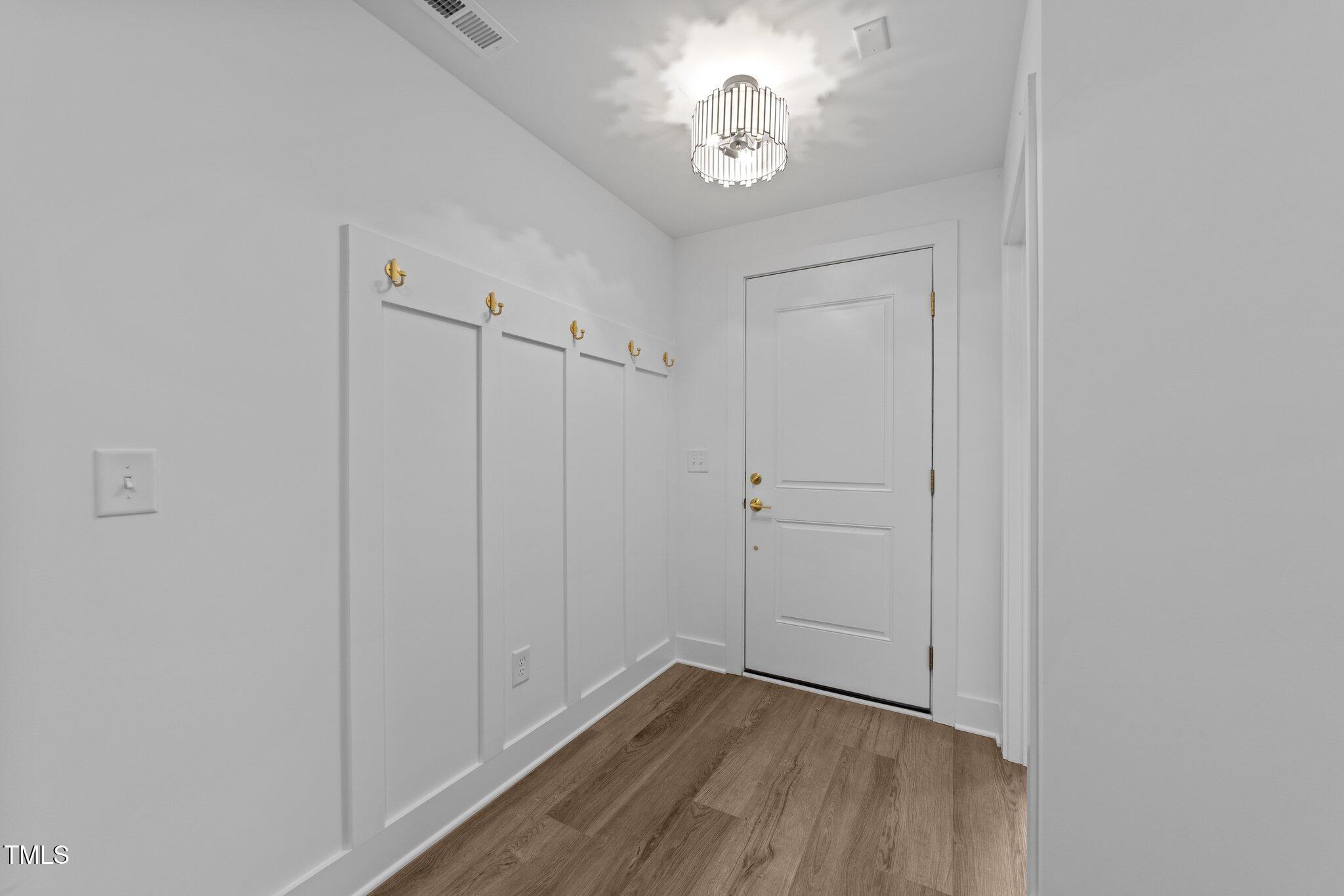 710 West North Street, Unit 102 Raleigh, NC 27603 - Photo 6 of 37 a view of an empty room with a window