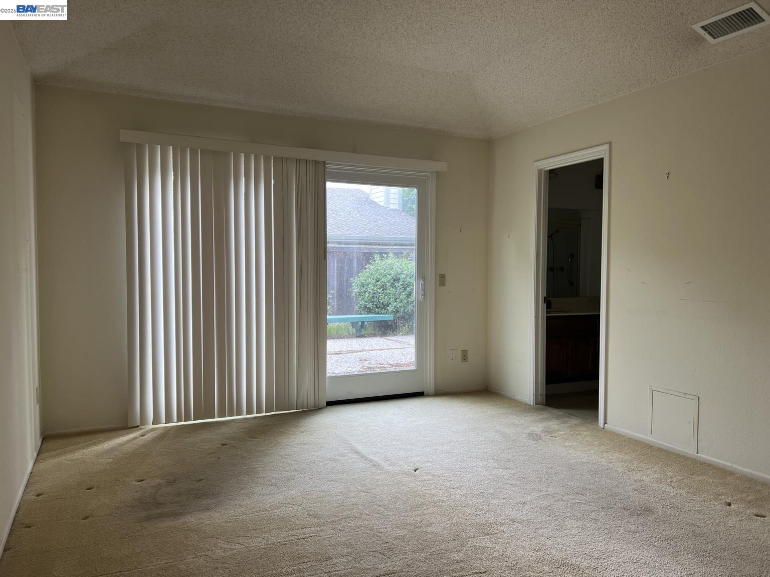 212 Puddingstone Road Alameda, CA 94502 - Photo 18 of 24 an empty room with windows
