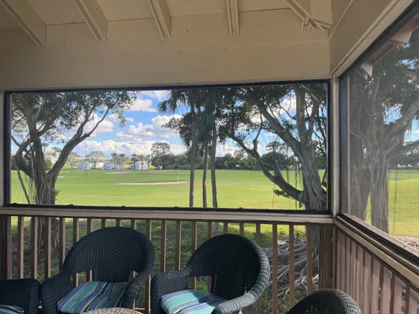 a view of swimming pool from a balcony