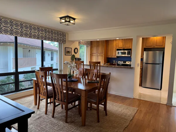 a view of a dining room with furniture