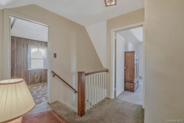a view of a livingroom from a hallway