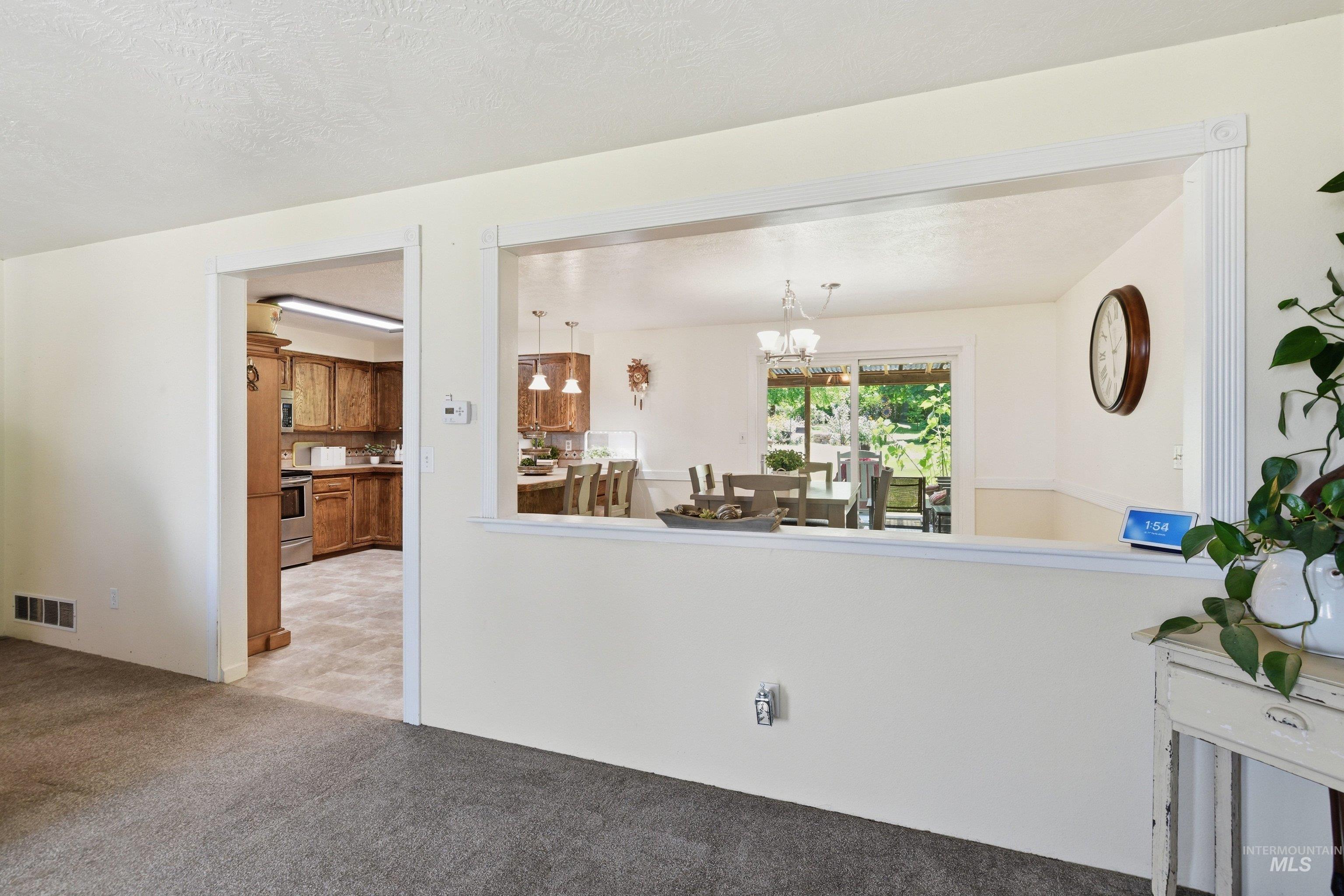 15095 David Street Caldwell, ID 83607 - Photo 11 of 39 Interior pass-through window with decorative trim