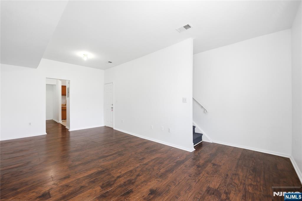44 1/2 3rd Street, Unit 2 Newark, NJ 07107 - Photo 13 of 15 a view of empty room with wooden floor