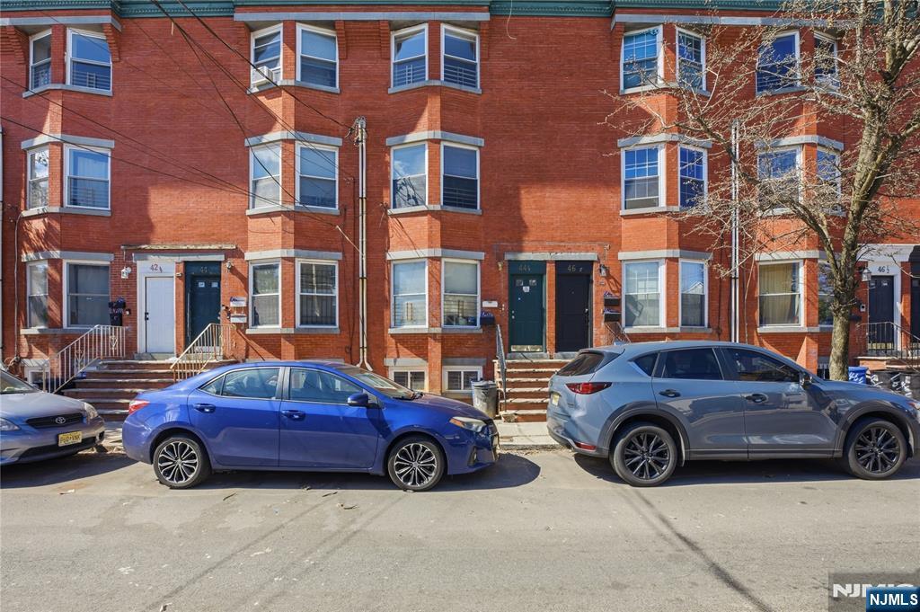 44 1/2 3rd Street, Unit 2 Newark, NJ 07107 - Photo 3 of 15 a view of a car parked in front of a building