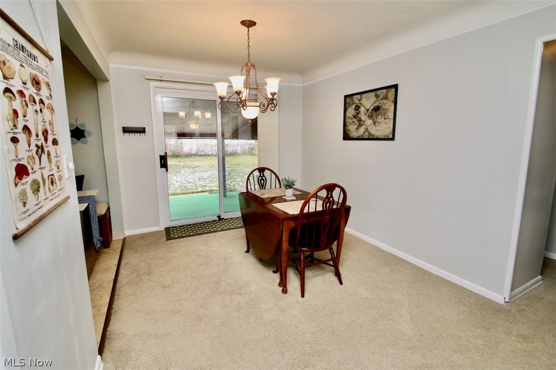 1748 Crestwood Road Cleveland, OH 44124 - Photo 7 of 28 Dining room leading to back patio