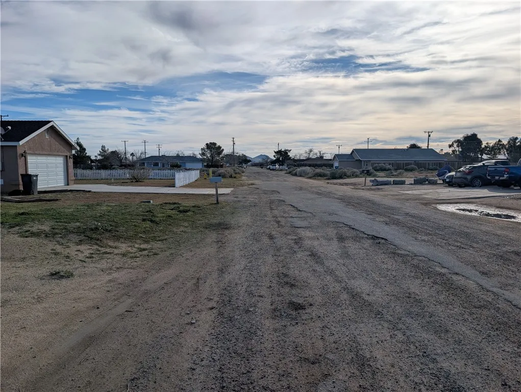 0 Jacaranda Avenue, Unit 2 Edwards, CA 93523 - Photo 4 of 4 a view of a dry yard with wooden fence