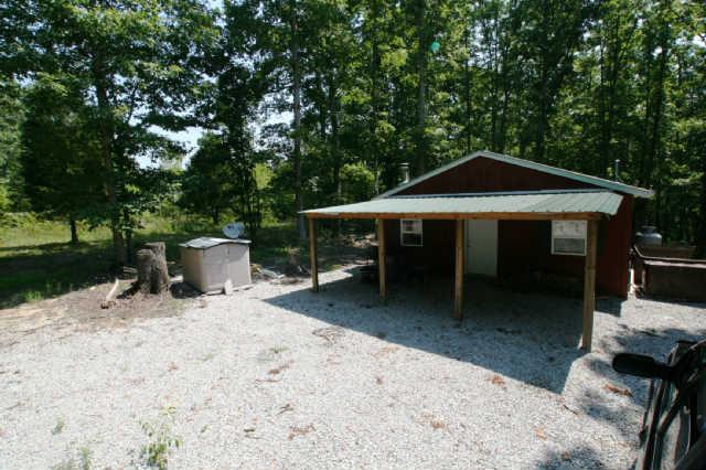 1 South L Mccaleb Road Nunnelly, TN 37137 - Photo 14 of 20 small cabin on the property is great for overnight trips, includes furnishings!