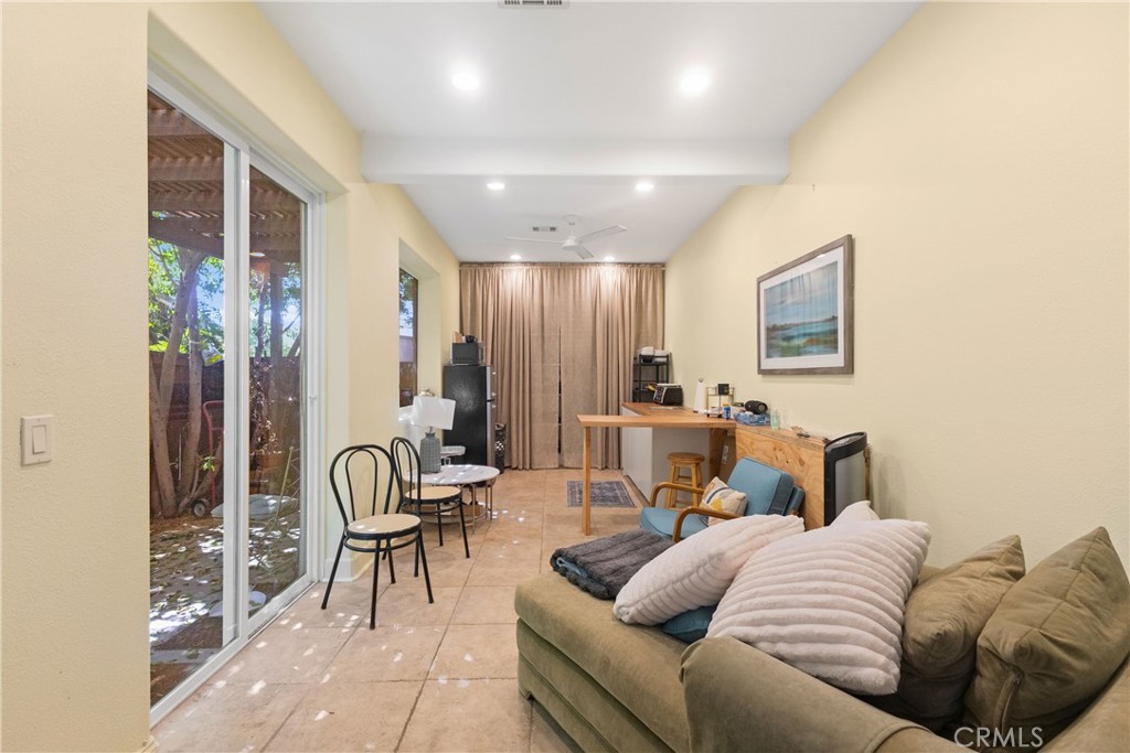 25960 Schafer Drive Murrieta, CA 92563 - Photo 16 of 46 a living room with furniture and a potted plant