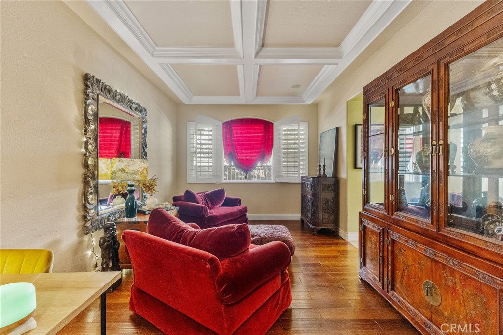25960 Schafer Drive Murrieta, CA 92563 - Photo 27 of 46 a living room with furniture a floor to ceiling window and a flat screen tv