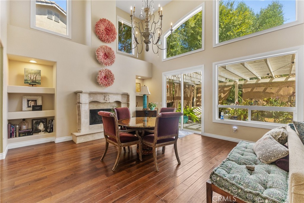 25960 Schafer Drive Murrieta, CA 92563 - Photo 37 of 46 a dining room with furniture window and wooden floor
