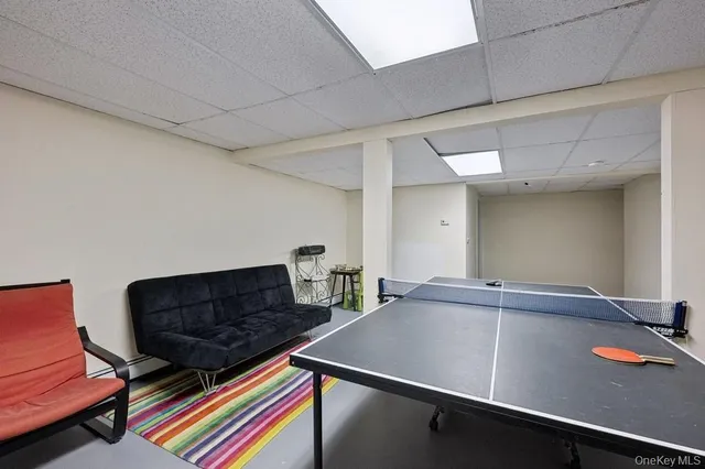 a room with furniture and screen