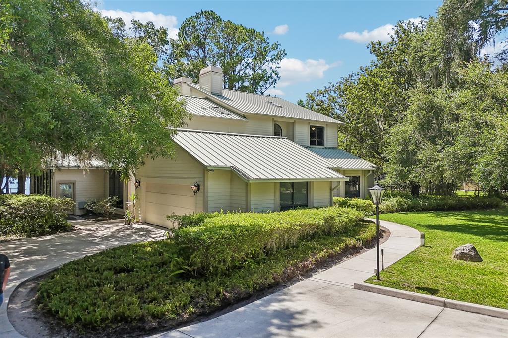17810 Crawley Road Odessa, FL 33556 - Photo 70 of 76 a front view of a house with a yard