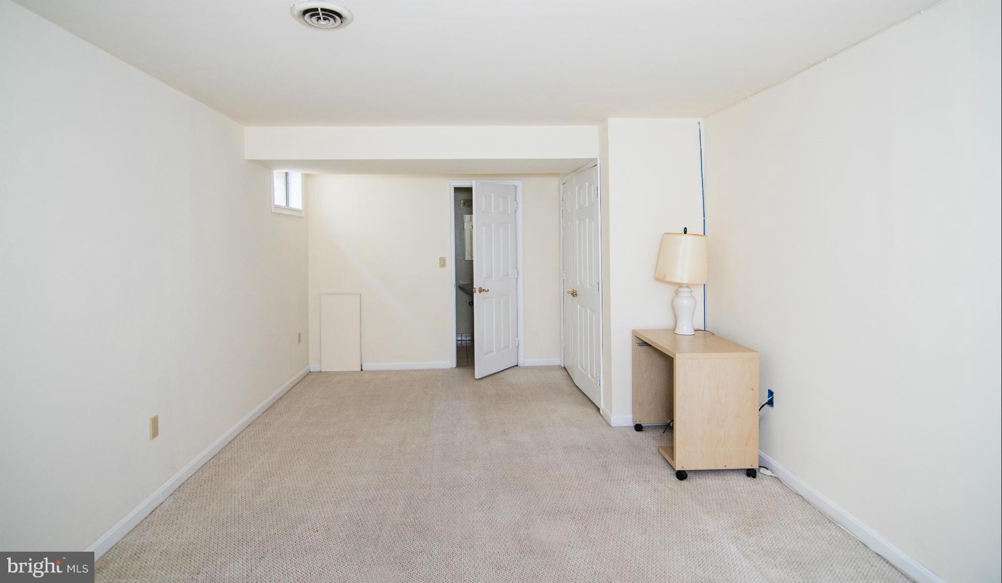4 Midsummer Court Gaithersburg, MD 20878 - Photo 18 of 24 an empty room with windows
