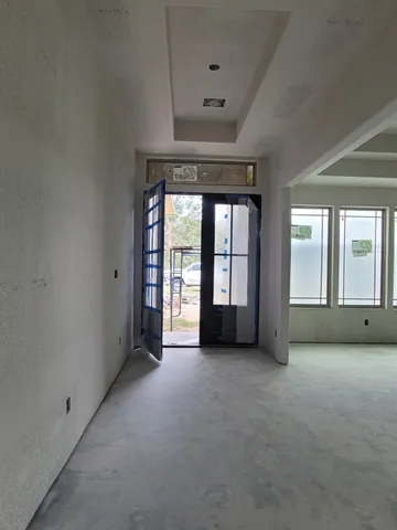 an empty room with windows