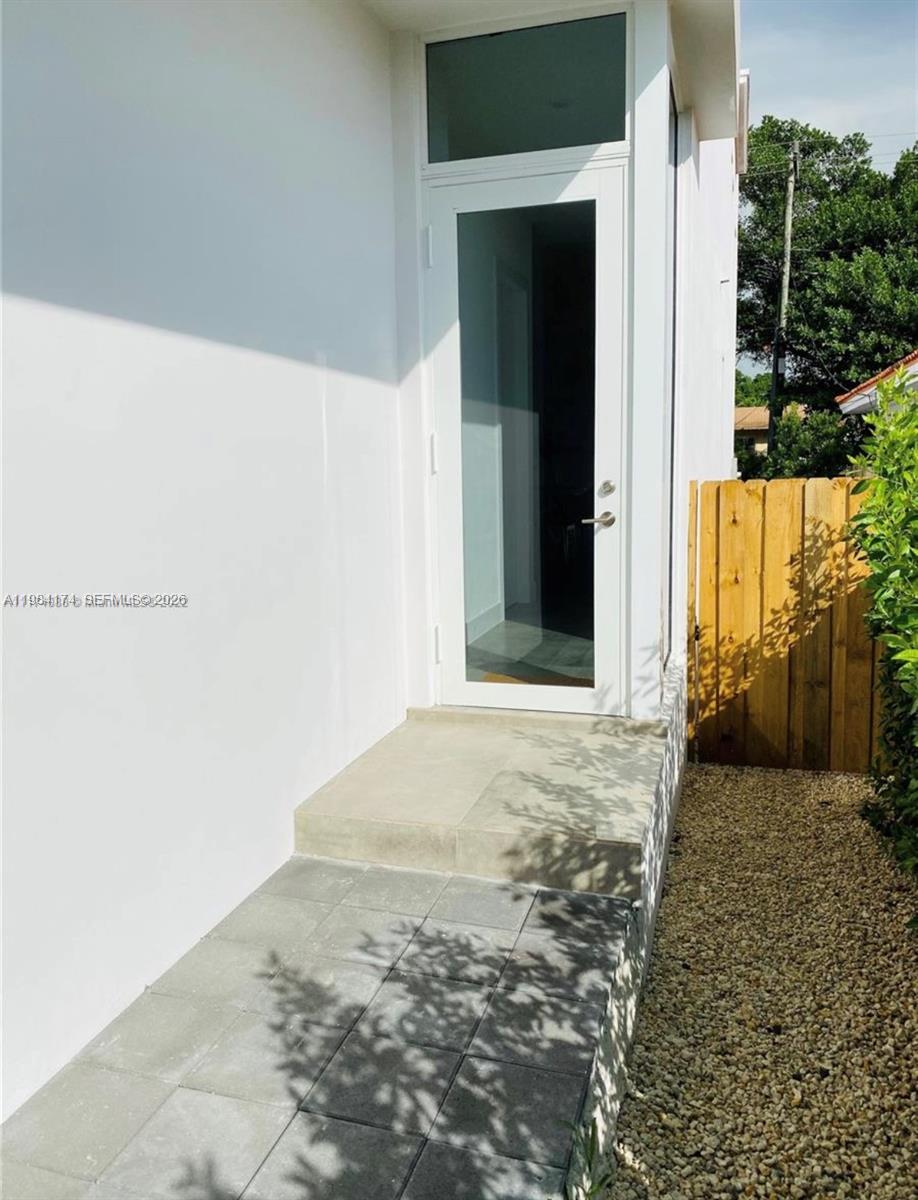 3653 Southwest 25th Street, Unit 3653 Miami, FL 33133 - Photo 2 of 18 a view of a front door