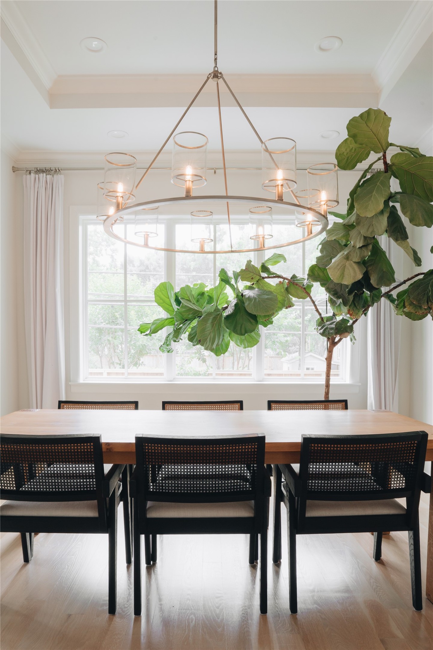 3817 Aberdeen Way Houston, TX 77025 - Photo 11 of 45 Dining area with view of flowering trees in back.