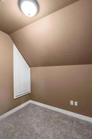 a view of a chairs and table in the patio