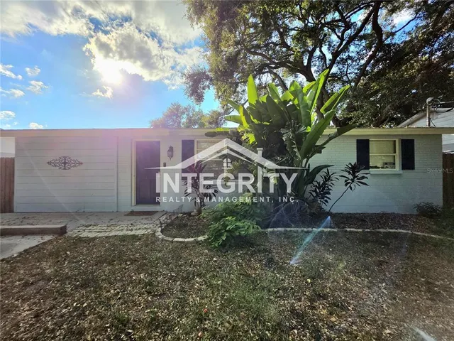 a house view with a outdoor space