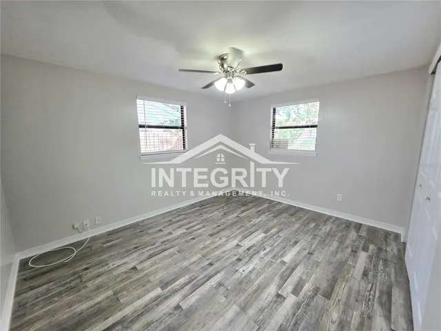 a bathroom with a toilet a sink and a mirror
