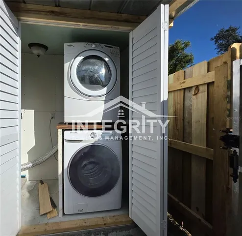 a view of a yard with a trampoline
