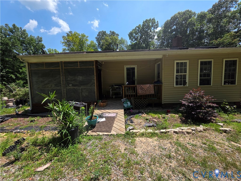 3161 Dorrell Road Aylett, VA 23009 - Photo 26 of 41 front view of a house with a yard
