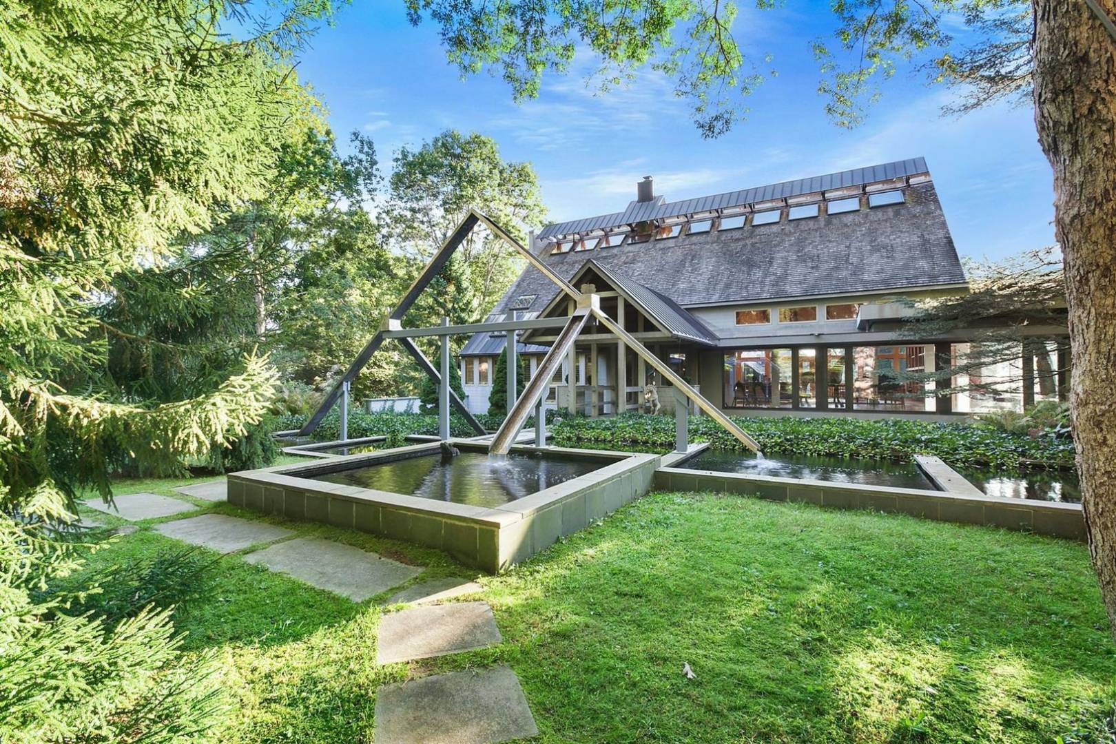 40 Sayre's Path Wainscott, NY 11975 - Photo 2 of 14 a view of a house with backyard