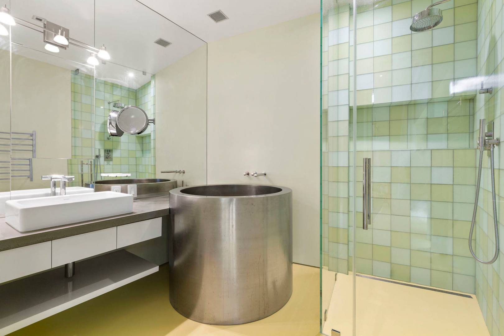 40 Sayre's Path Wainscott, NY 11975 - Photo 14 of 14 a bathroom with a bathtub and a sink