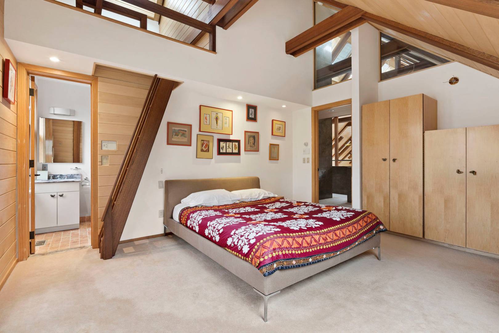 40 Sayre's Path Wainscott, NY 11975 - Photo 5 of 14 a bedroom with a bed and a walk in closet