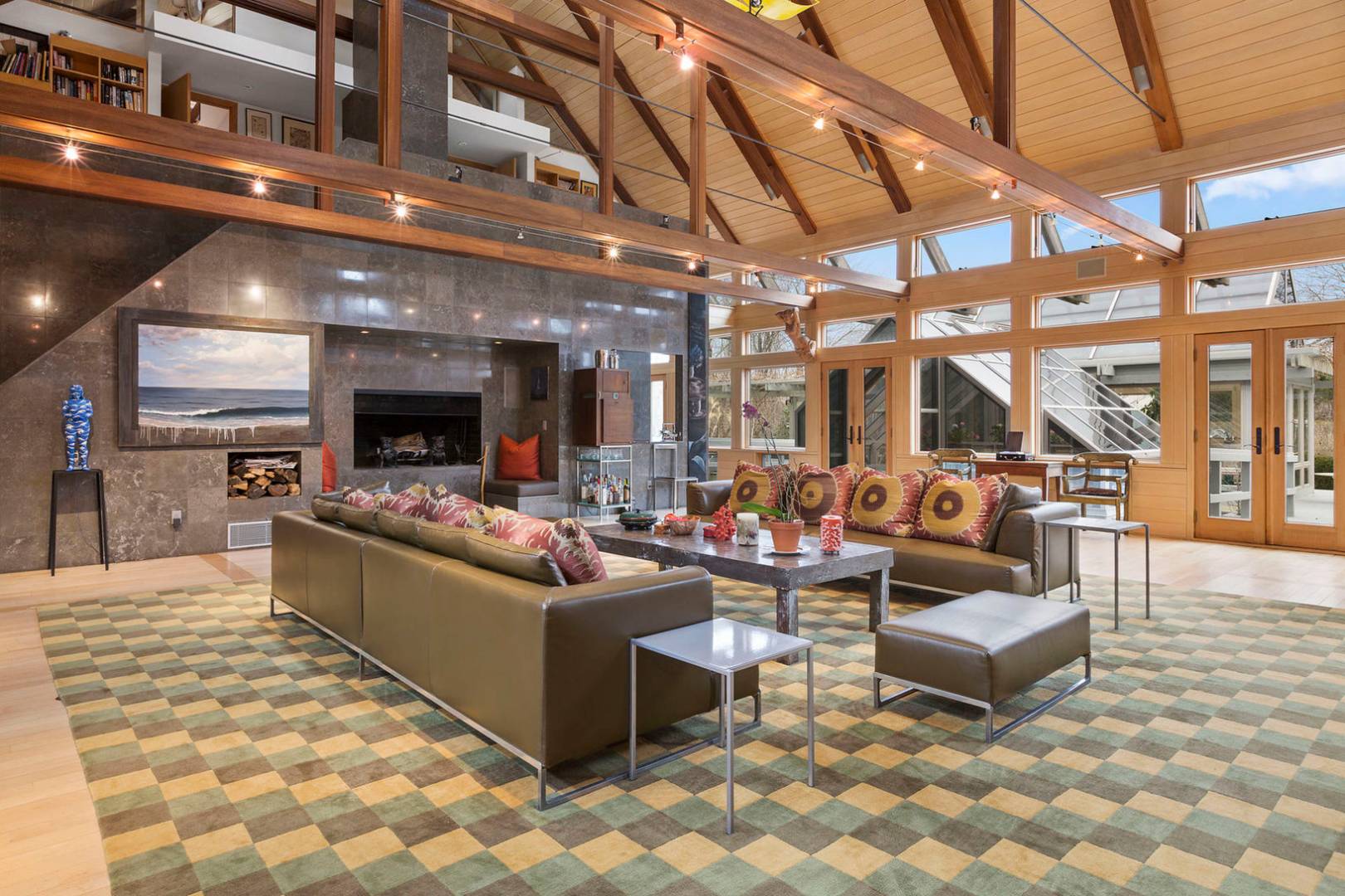 40 Sayre's Path Wainscott, NY 11975 - Photo 8 of 14 a living room with furniture and a flat screen tv