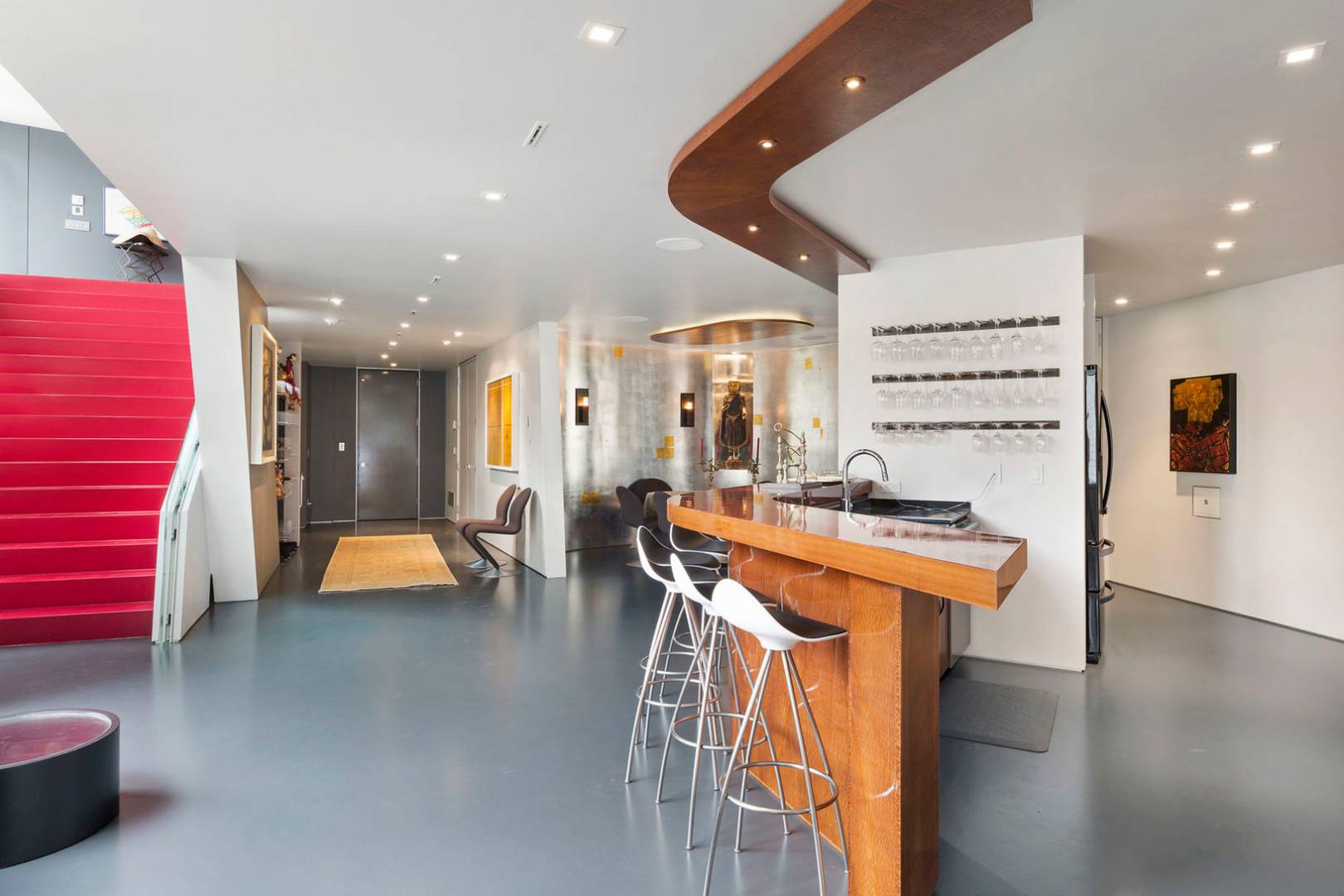 40 Sayre's Path Wainscott, NY 11975 - Photo 9 of 14 a view of a room with furniture and wooden floor