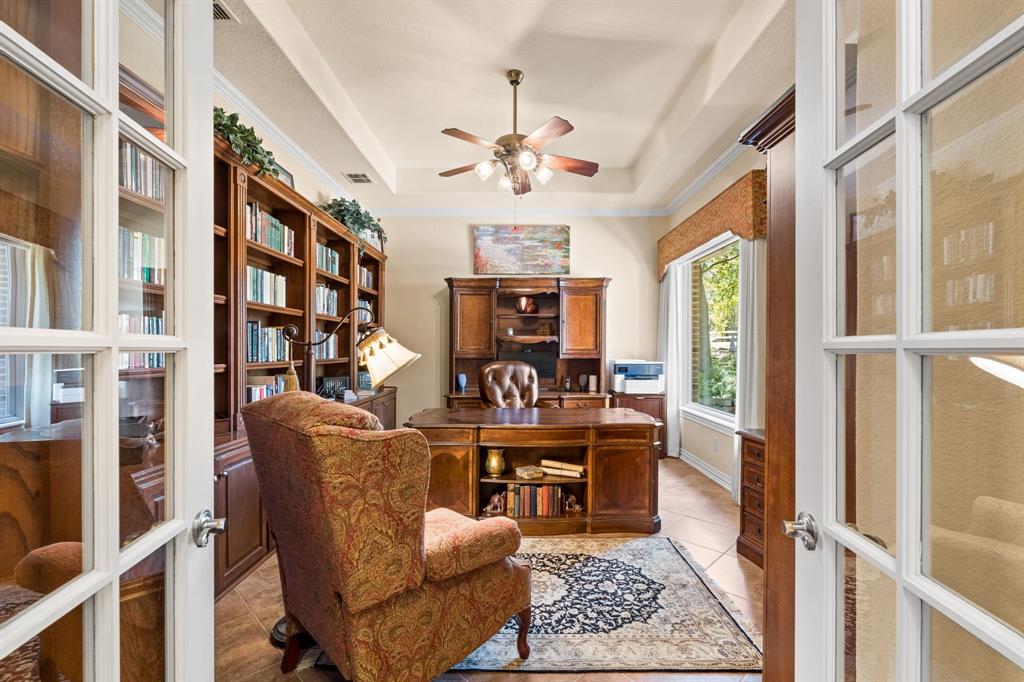 10072 Bluffview Circle Pilot Point, TX 76258 - Photo 7 of 38 Office space featuring french doors, a ceiling fan, light tile patterned floors, and a raised ceiling