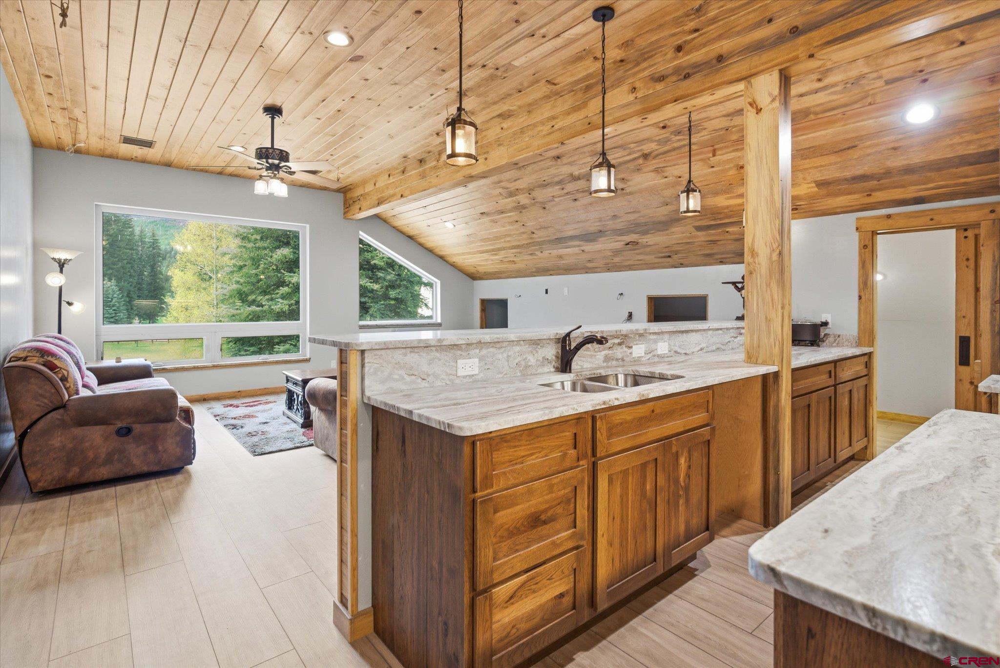 197 Hummingbird Way Bayfield, CO 81122 - Photo 33 of 44 a living room with stainless steel appliances granite countertop furniture and a kitchen view