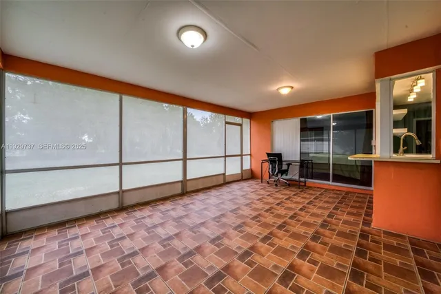 a view of storage and utility room with washer and dryer