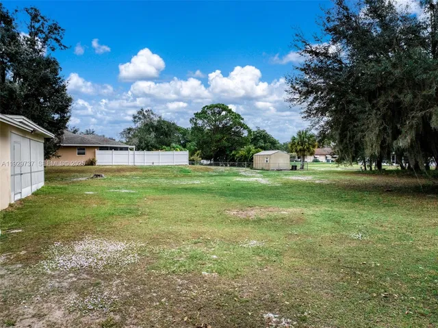 a view of a garden with a houses