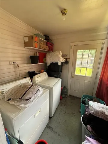 a bed room with bed and a window