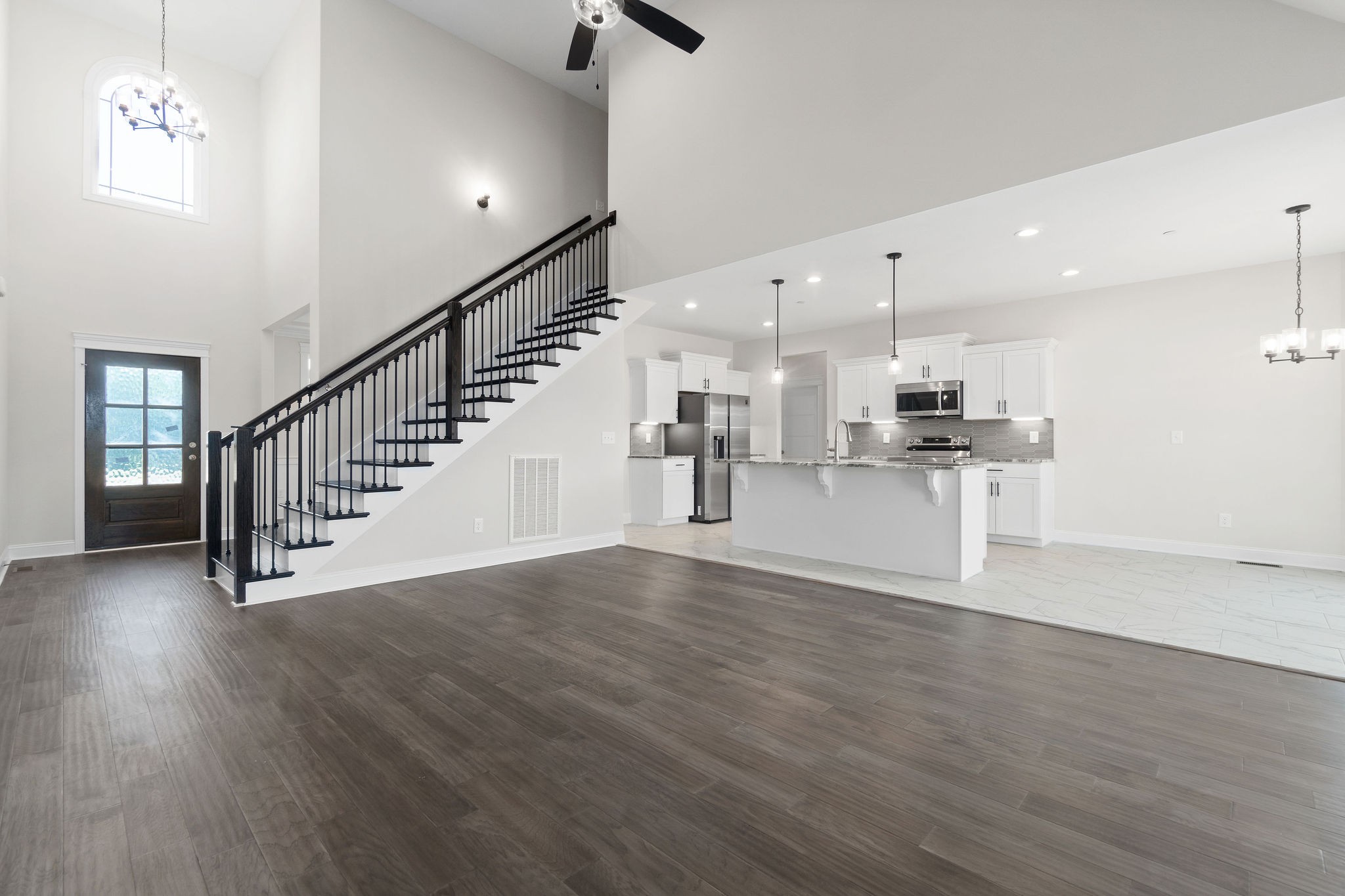 6507 Blacksmith Drive Pleasant View, TN 37146 - Photo 3 of 5 a view of a kitchen with furniture and wooden floor