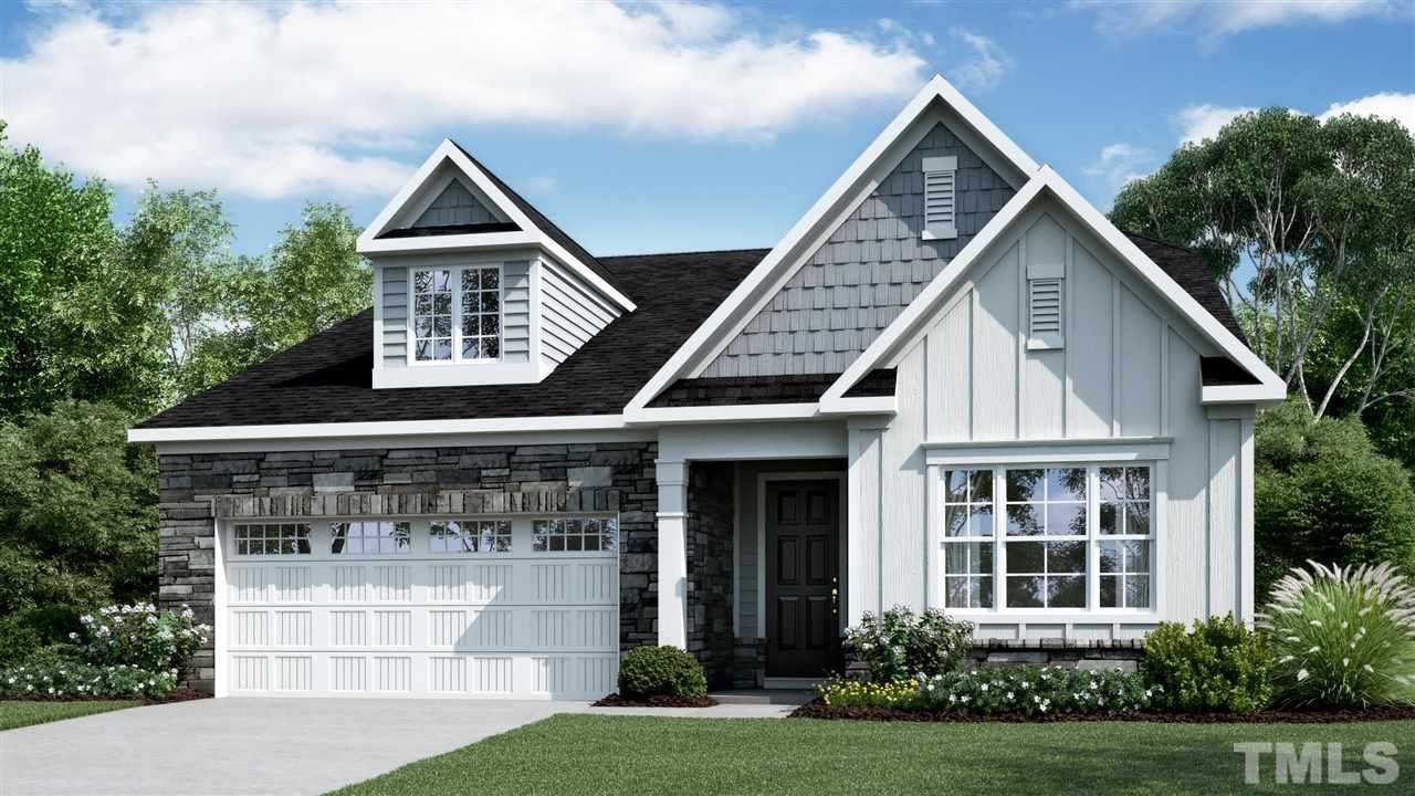 171 Mahogany Run, Unit 168 Raleigh, NC 27610 - Photo 1 of 2 a front view of a house with a yard