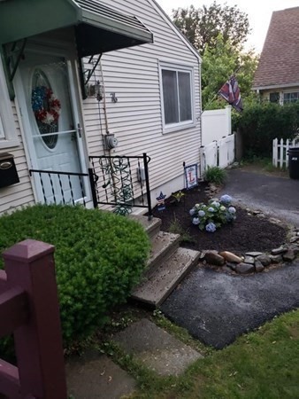 76 Canterbury Road Springfield, MA 01118 - Photo 3 of 27 a view of a backyard with sitting area