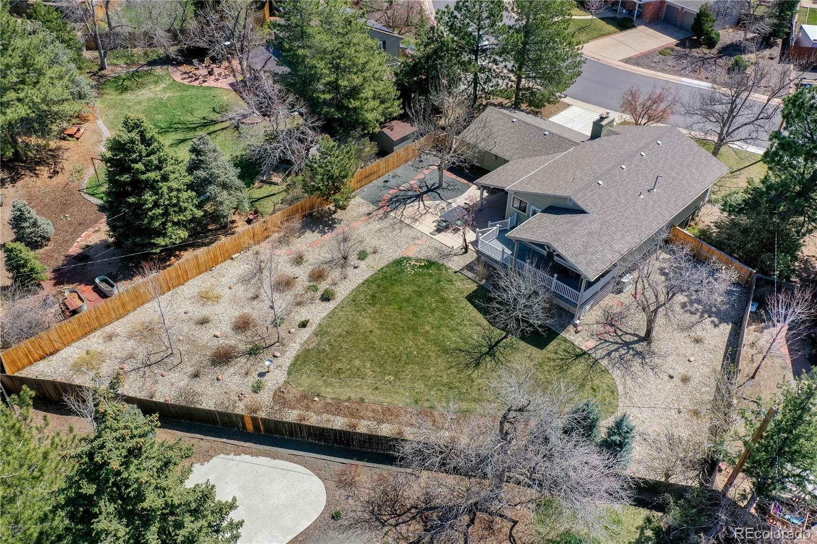 3815 East Easter Place Centennial, CO 80122 - Photo 27 of 35 an aerial view of a house with a yard