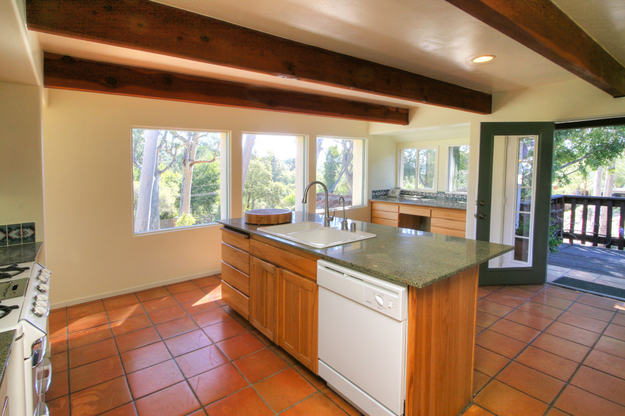 1331 Tunnel Road Santa Barbara, CA 93105 - Photo 12 of 22 a kitchen with granite countertop a sink and a stove