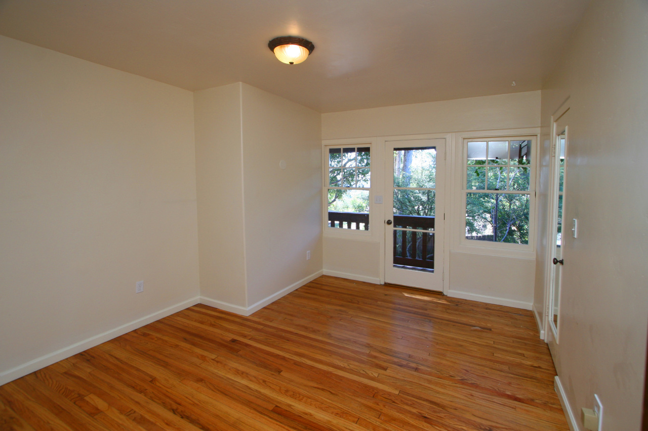 1331 Tunnel Road Santa Barbara, CA 93105 - Photo 14 of 22 wooden floor in an empty room with a window