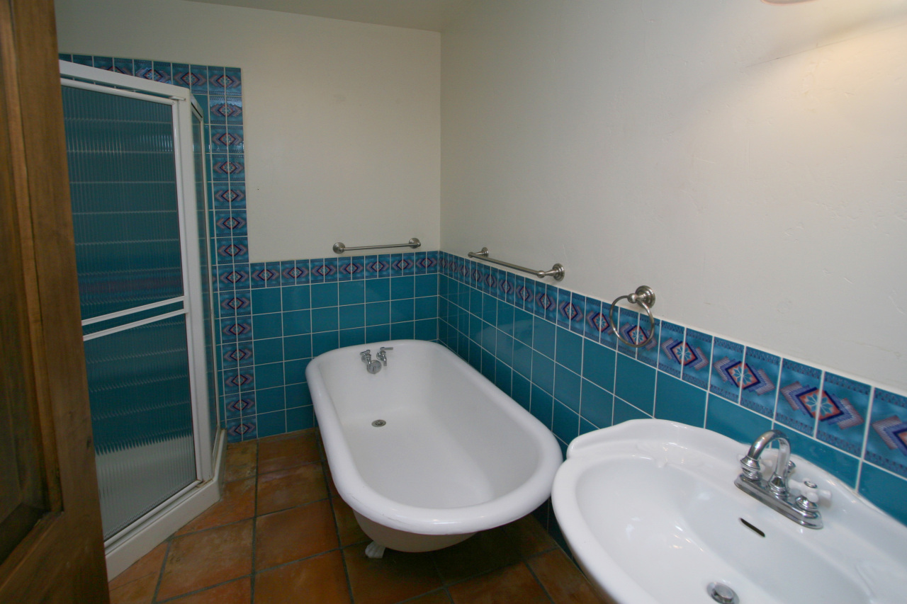 1331 Tunnel Road Santa Barbara, CA 93105 - Photo 16 of 22 a bathroom with a sink and mirror