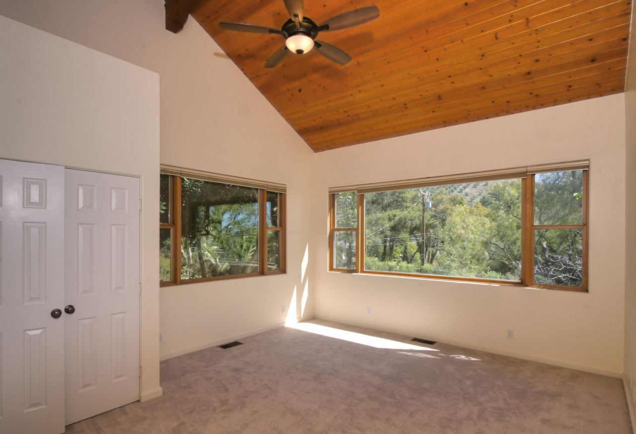 1331 Tunnel Road Santa Barbara, CA 93105 - Photo 19 of 22 an empty room with windows and closet