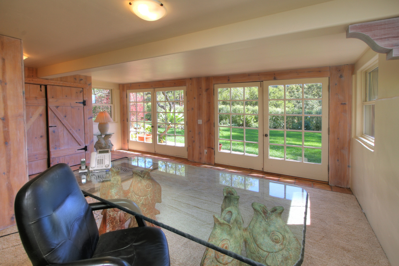 1331 Tunnel Road Santa Barbara, CA 93105 - Photo 20 of 22 a dining room with furniture and a large window