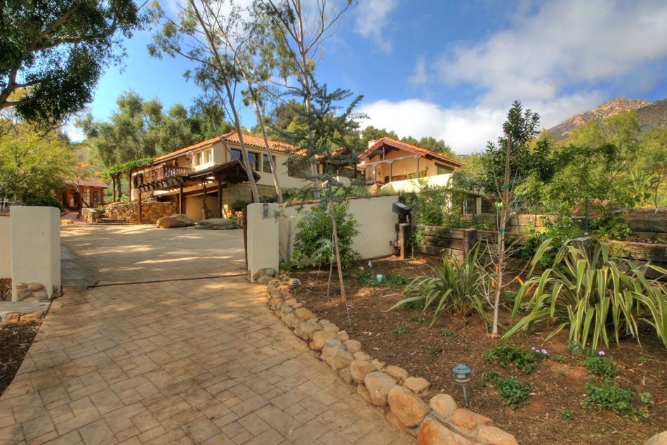 1331 Tunnel Road Santa Barbara, CA 93105 - Photo 2 of 22 a view of a yard with plants and trees