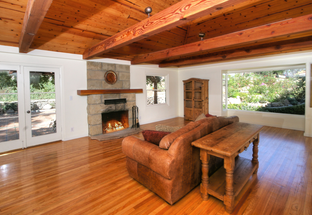 1331 Tunnel Road Santa Barbara, CA 93105 - Photo 10 of 22 a living room with furniture and a fireplace
