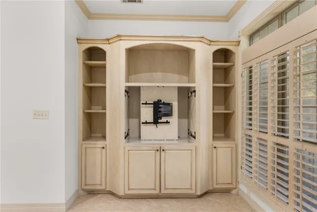 a kitchen with stainless steel appliances a stove refrigerator sink and cabinets