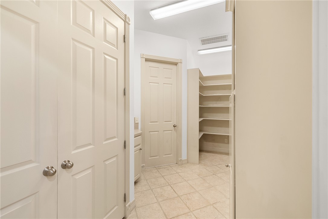 5011 Fairfield Court Bryan, TX 77802 - Photo 18 of 46 a view of a walk in closet