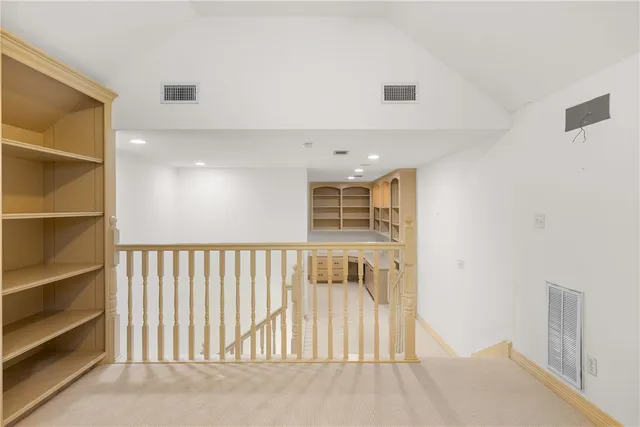 a view of bedroom with furniture and window