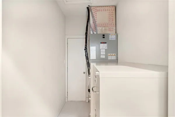 a stove top oven sitting inside of a kitchen